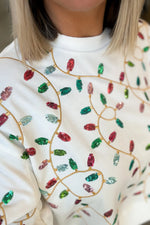 MILLIE HOLIDAY LIGHTS SWEATSHIRT