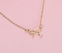 MINI GOLD BOW CHARM NECKLACE