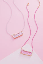 DANCE GLITTER SHAKER NECKLACE